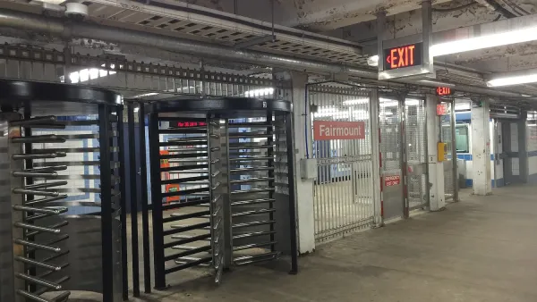 Floor-to-ceiling rotating gates at Fairmount subway station in Philadelphia, Pennsylvania.